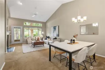 Vaulted ceilings and ceiling fans create an airy, comfortable living space.