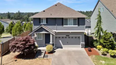 Front porch and double garage