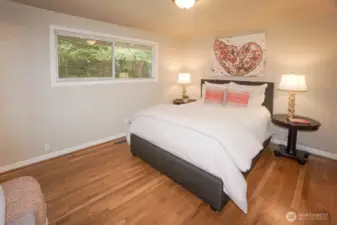 Primary Bedroom with Window to Backyard