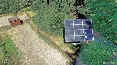 Equipped with existing solar infrastructure, this home offers the next owner the opportunity to easily upgrade to a high-efficiency solar system with significant cost-saving potential. Full Disclosure: Seller says the current system costs more to maintain than it generates in electricity.  Suggest a professional solar audit to assess the system's condition, output and potential upgrades.  Sometimes minor adjustments (like inverter updates, panel cleaning, or repositioning) can significantly improve efficiency.