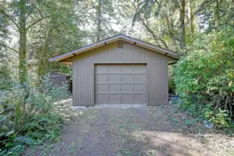 The detached garage offers more than just vehicle storage. It's a fully independent space ideal for workshop, studio, home gym. With ample square footage, easy access, and separation from the main home, it provides both privacy and possibility.  Adjacent to it, the standalone shed adds a second layer of utility - perfect for storing tools, gardening gear, outdoor equipment of seasonal decor.