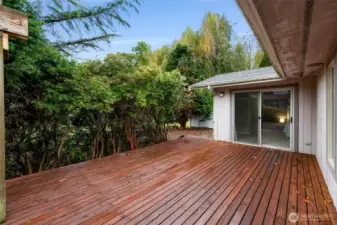Back deck with privacy and steps to The Commons community park