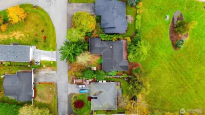 Arial view of home and well maintained community park