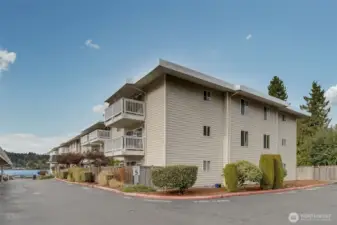 End unit second floor, this unit is stepped out from the main building for a great lake view.