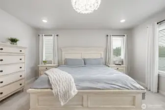 Spacious primary suite with plenty of natural light.