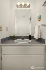 1/2 bath connected to the third bedroom.