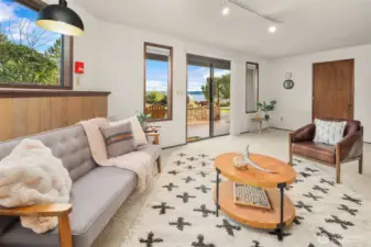 The sliding glass door opens to a sweet patio space. Or access the 2-car garage from one of two doors in the lower level.