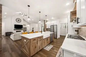 Connect and have conversations between the kitchen and family room. Modern farmhouse style! Butler's Pantry is right of fridge has a pocket door.