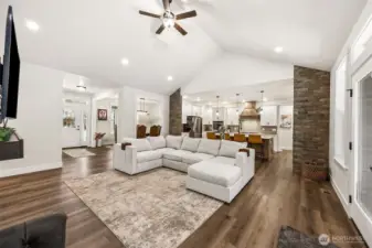 From family room looking toward main entry, dining room and kitchen.
