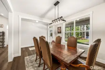 Dining Room faces the front of home just off the home's entry, adjacent to the kitchen & family room.