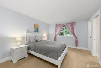 Delightful primary bedroom of the main floor