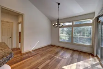 Large dining area in the Great Room. Large windows and sliding door to the back deck.