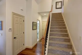 Note a half bath is next to the stairs. Door leading to the garage is also next to the half bath.