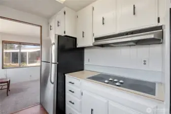 Check out the well-maintained original kitchen cabinets.