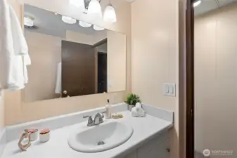 Notice the large mirror and extra counterspace.