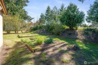Enjoy the privacy of this green buffer on the back side of the lot.