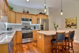 Lovely updated kitchen with new quartz counters,  & SS appliances,