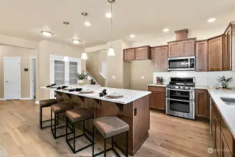 Home is under construction. Photos of a previously built home with similar finishes that are staged. Builder reserves the right to make changes to plans & specifications without notice. Features vary by plan. Buyer to verify square footage.