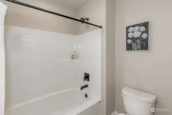 Private shower room in the full bathroom.