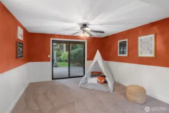 Lower level rec room has access to backyard.