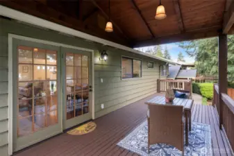 Enter covered deck from dining area.