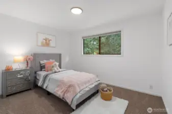 Bedroom 1 is located across from Primary bedroom.
