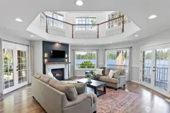 Another view of the living room with cozy fireplace and those views!