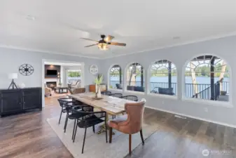 Dining room with views to the lake with deck beyond. Room is large enough to accomodate all your dining furniture.