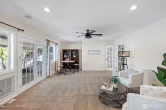 Another view of the 2nd floor bonus room, french doors on the right to the hallway.