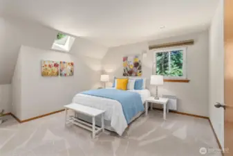 Spacious upstairs bedroom.