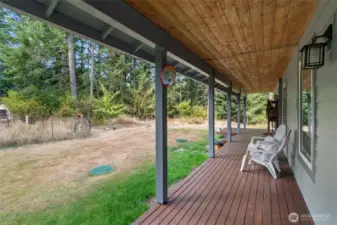 French doors lead to the wrap-around covered porch, which is the perfect spot to relax, entertain or watch the birds & wildlife!