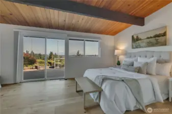 Wake up to the Mountain in this stunning master suite with sliders to the back deck