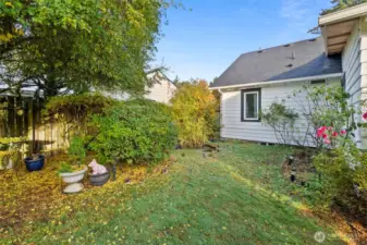 Backyard with view of pond