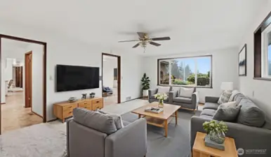 Bright and inviting living room, virtually staged to showcase the room’s spacious layout and natural light.