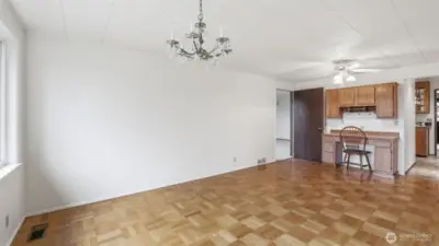 Open dining space offering multiple layout possibilities and easy flow to the kitchen.