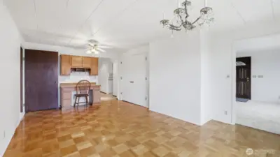 A clean, neutral dining space—ideal for customizing to fit your personal style.