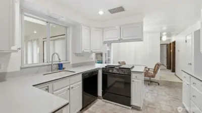 This open kitchen invites easy meal prep, casual conversation, and effortless everyday living.