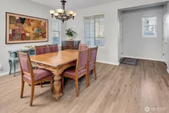The formal dining room is open, flowing w/abundance space for your favorite and large furnishings!