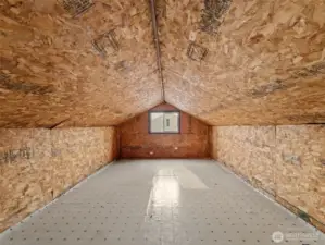 unfinished attic/loft accessible by staircase.