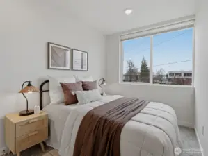 Bedroom #2 has a bright and airy feel