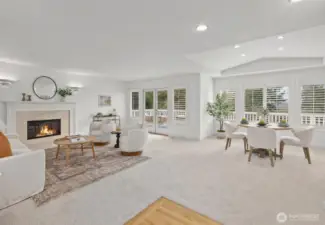Greeted with vaulted ceilings and natural light