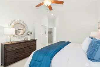 Vaulted ceilings and ceiling fan.