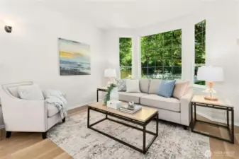 New flooring throughout and gorgeous bay window looking into your fully fenced front yard.