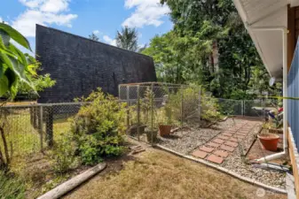 fenced garden space on the side yard