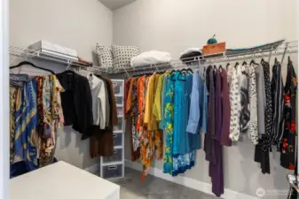 Primary walk-in closet angle 1