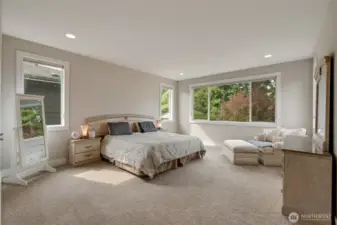 Luxurious Primary Suite with oversized walk-in & spa like private bath.