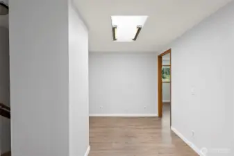 Upstairs hallway with skylight.