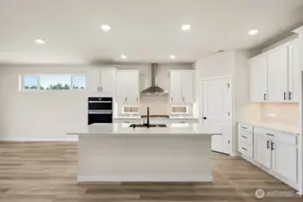 Photos are of a similar completed home.