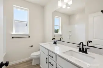 Photos are of a similar completed home.