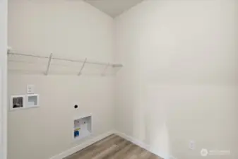 Photos are of a similar completed home.